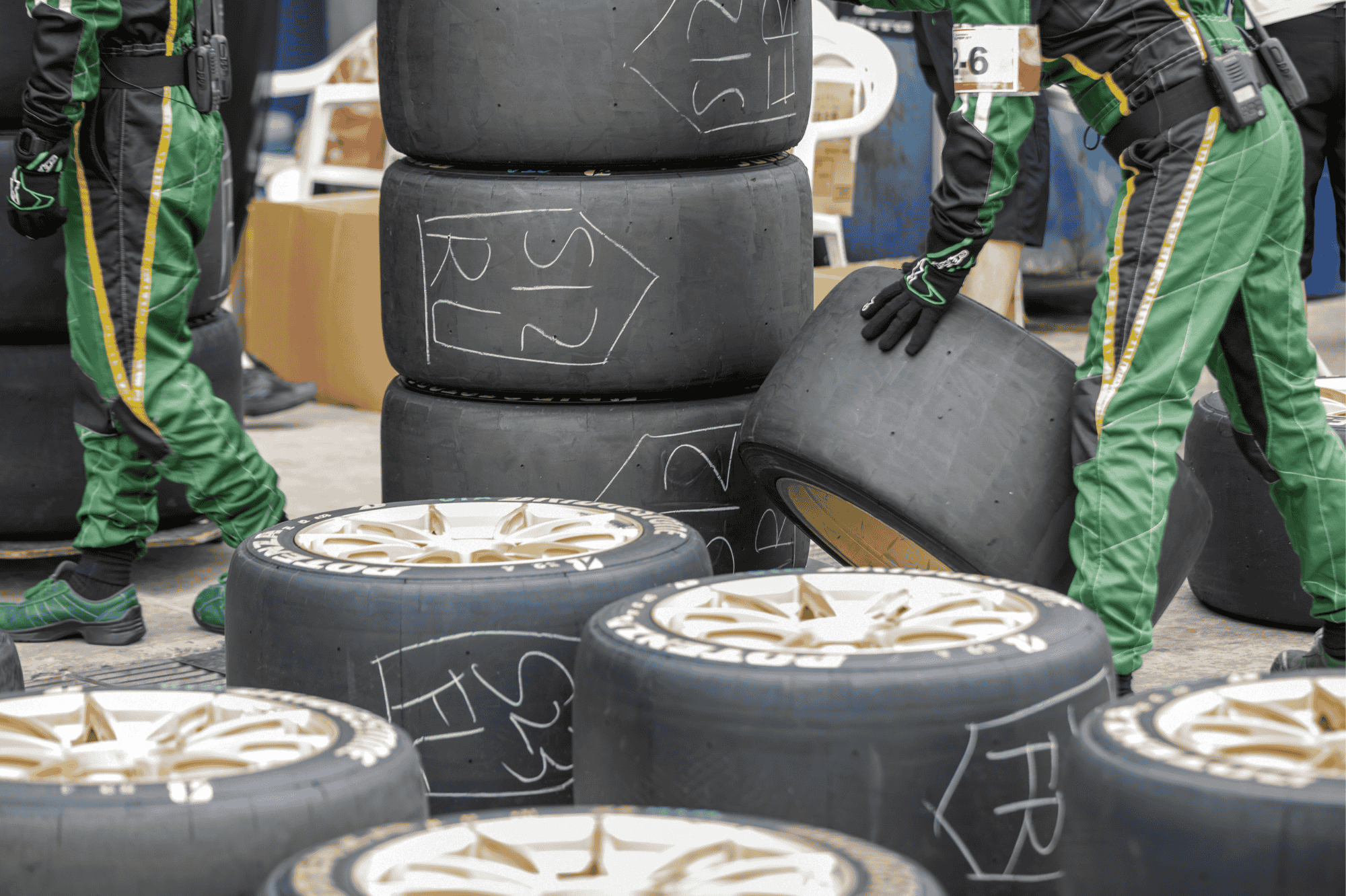 pit crew with tyres