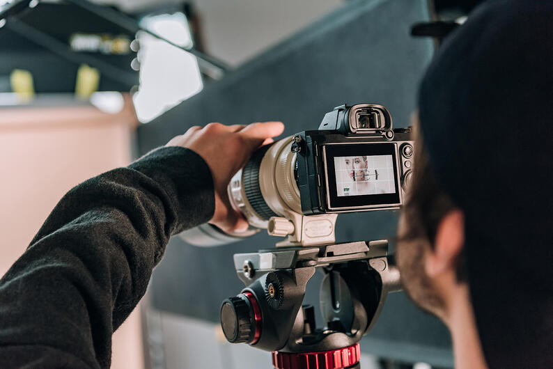 selective-focus-of-videographer-filming-woman-in-p-MK878GT (1)